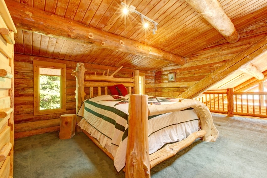 bedroom space features vaulted ceilings