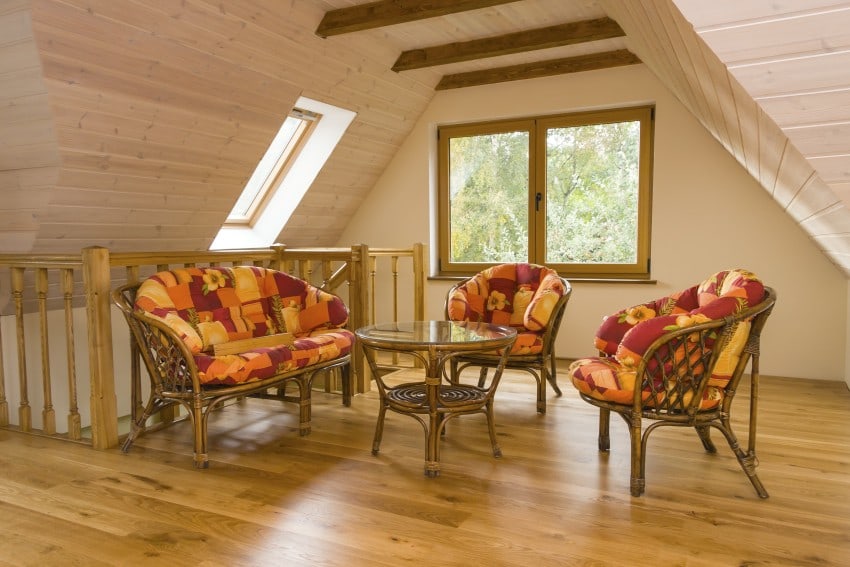 attic space that has been transformed into a casual social area. 
