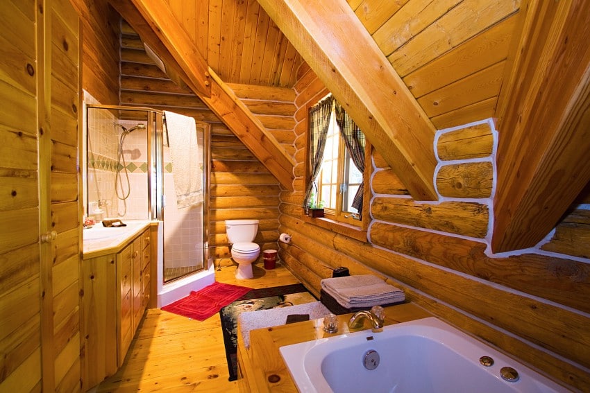 The interior of this bathroom is all wood 