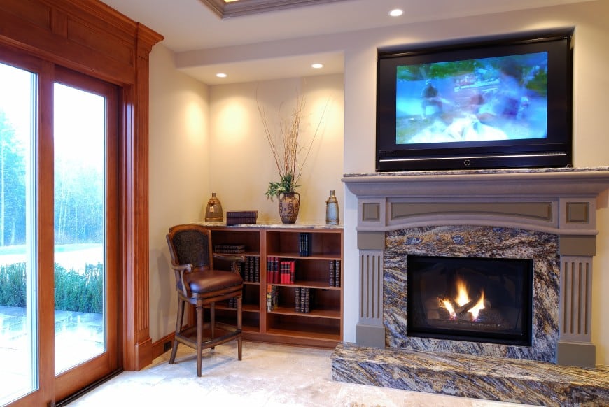 granite clad fireplace in living room