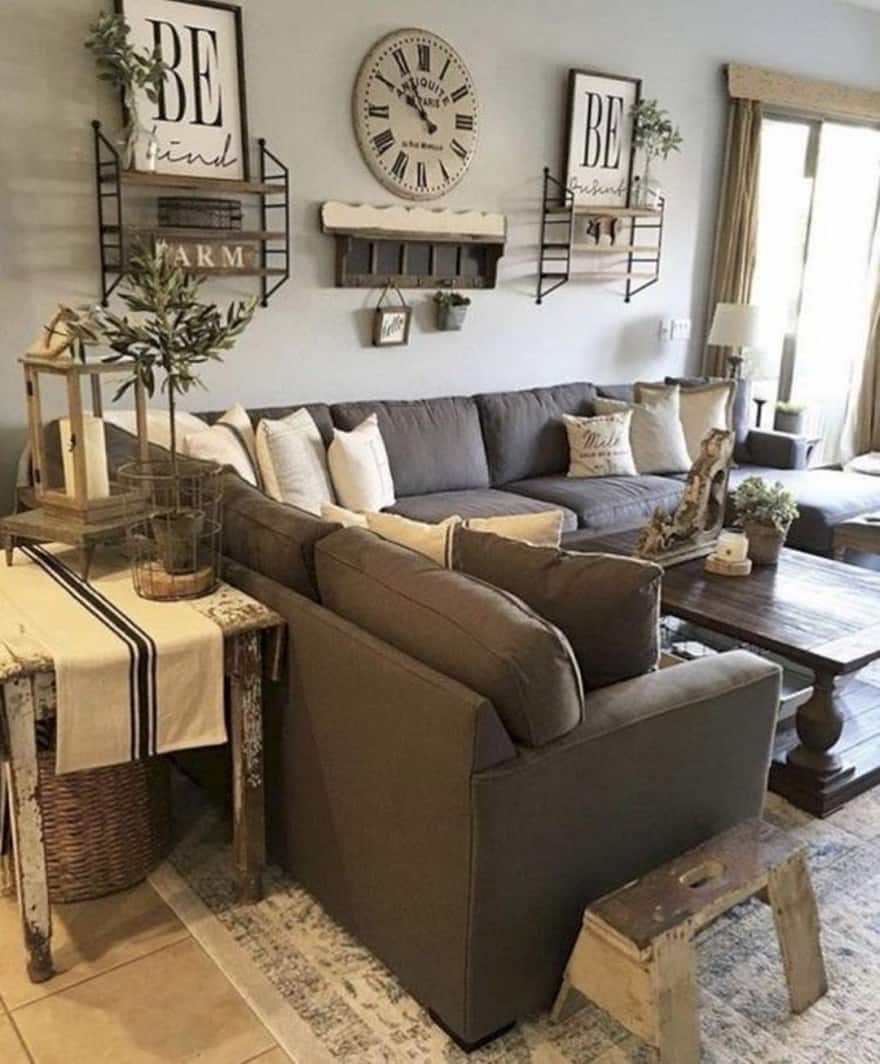 living room is set in warm beige, taupe and brown hues