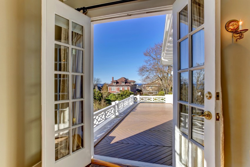 fully open french door towards a patio